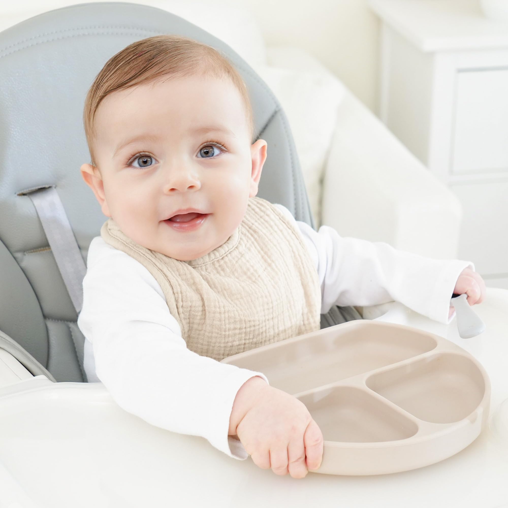 Bearmoss bib used as burp cloth, catching spills gently