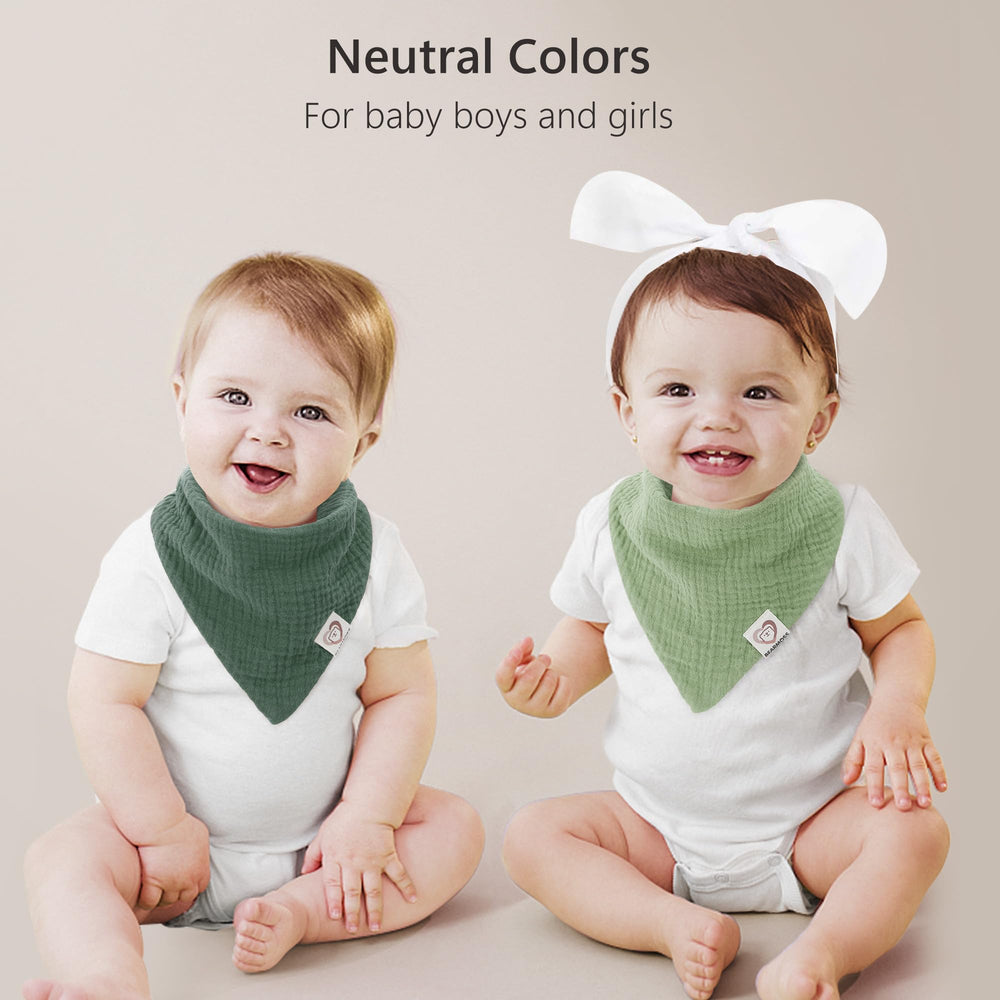 Bearmoss muslin bib used as burp cloth—soft, absorbent, multi-use accessory.