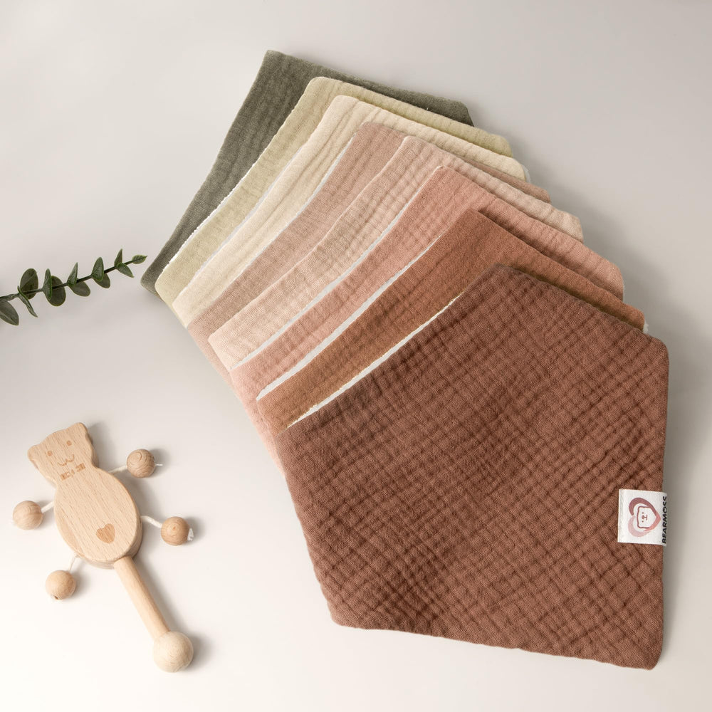 Bearmoss muslin bibs serve as a stylish newborn accessory while protecting clothing