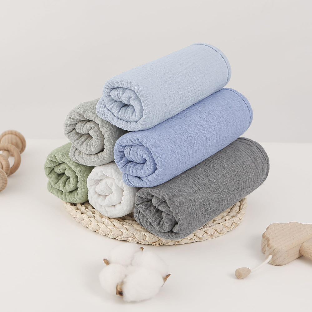 Bearmoss muslin burp cloths in neutral colors suit both genders.