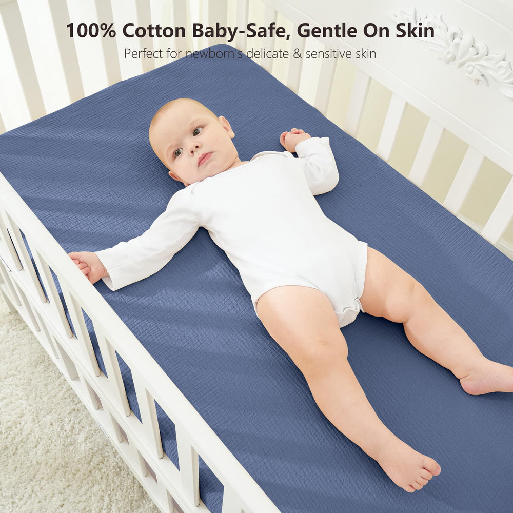 Bearmoss muslin crib sheets 52x28 on mattress showing snug fit and secure elastic