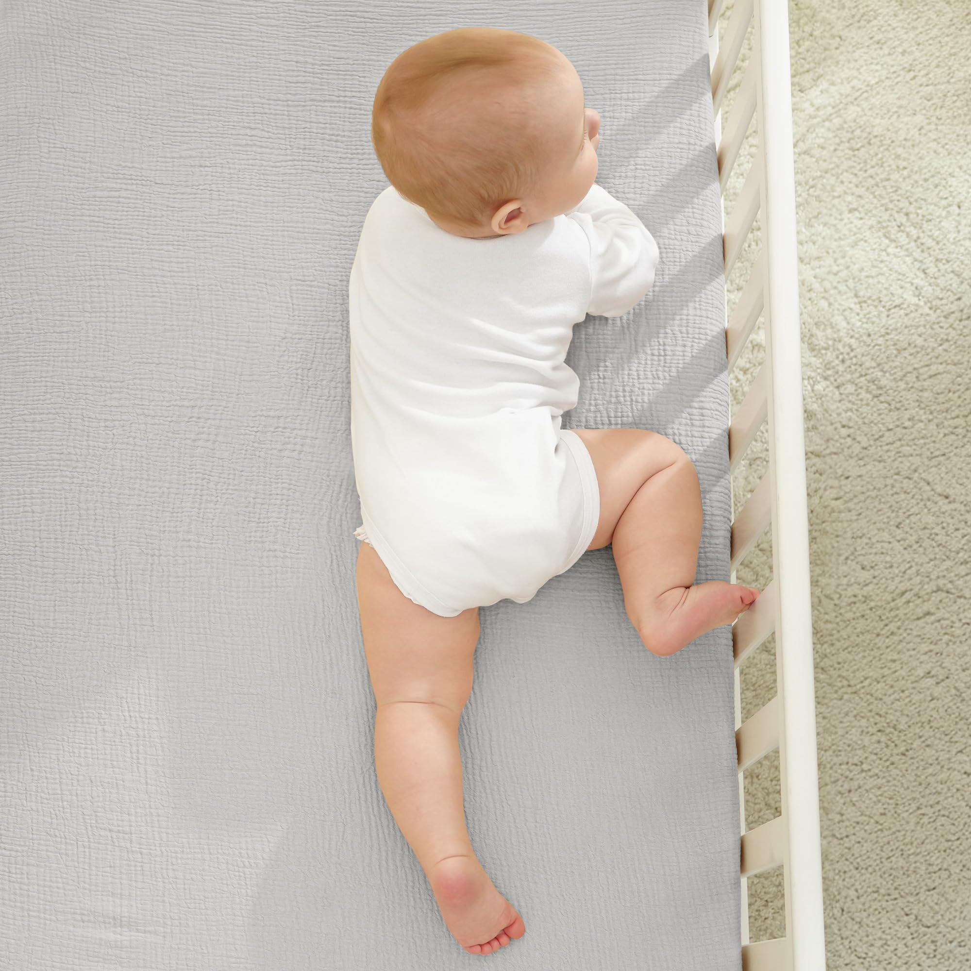 Bearmoss muslin crib sheets being machine washed for easy care and durability