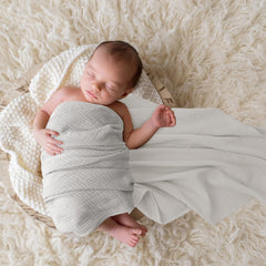 Bearmoss muslin swaddle blankets in nursery setup for versatile baby care