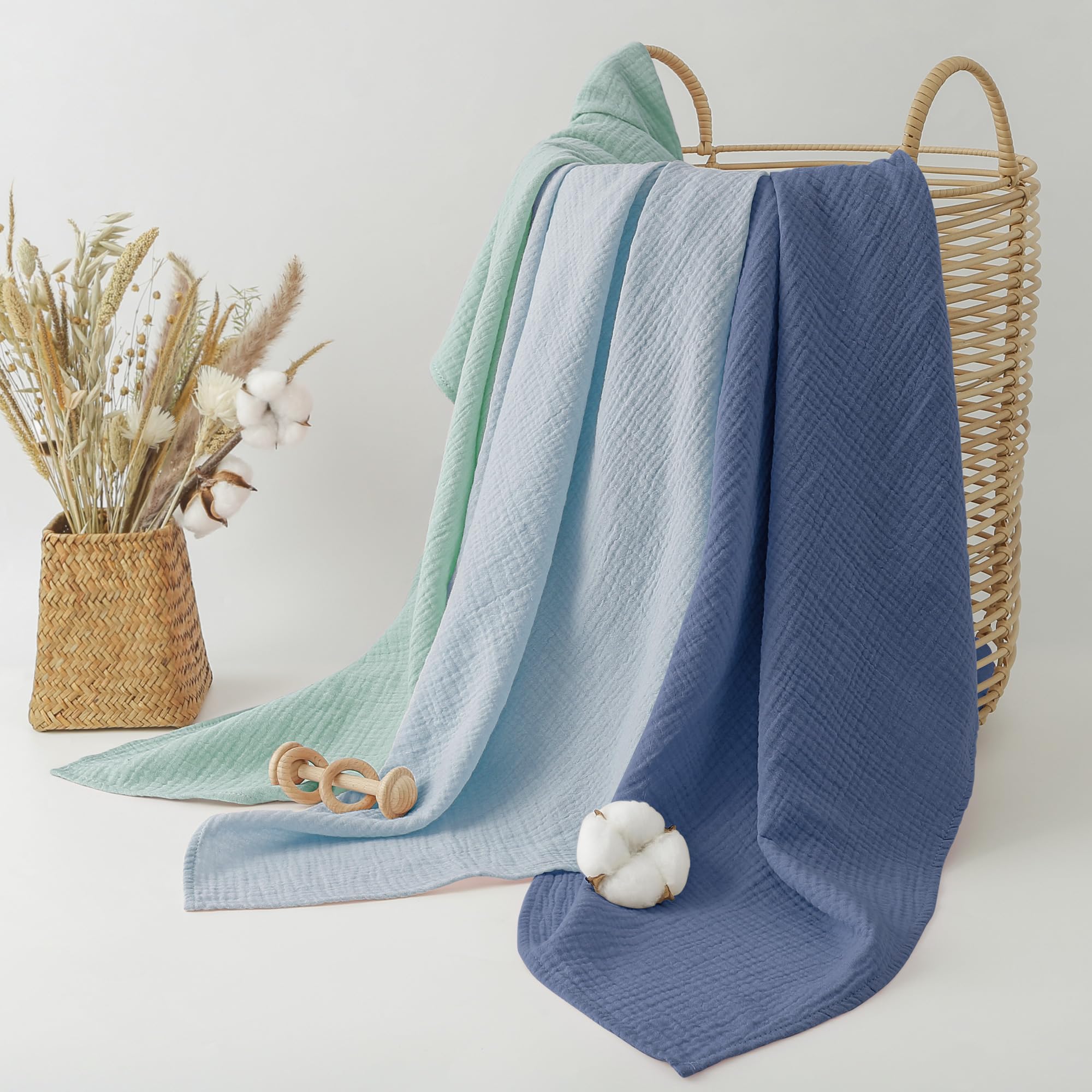 Bearmoss muslin swaddle blue-green baby sleeping peacefully demonstrates breathable cotton for comfortable naps