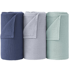 Bearmoss muslin swaddle blue-green closeup shows soft cotton and breathable weave for gentle skin and sleep support