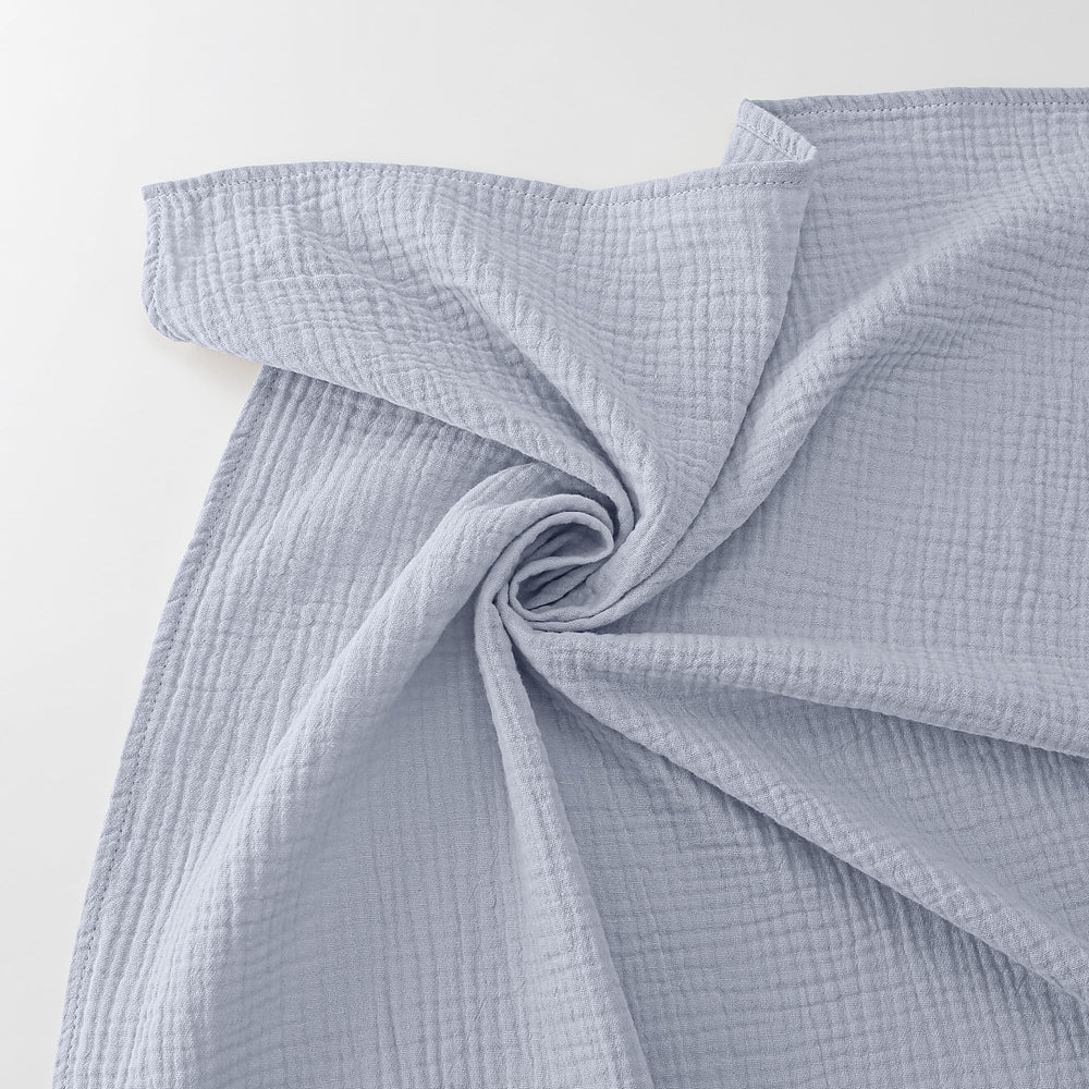 Bearmoss muslin swaddle blue-green nursery scene signals gift-ready packaging for baby showers
