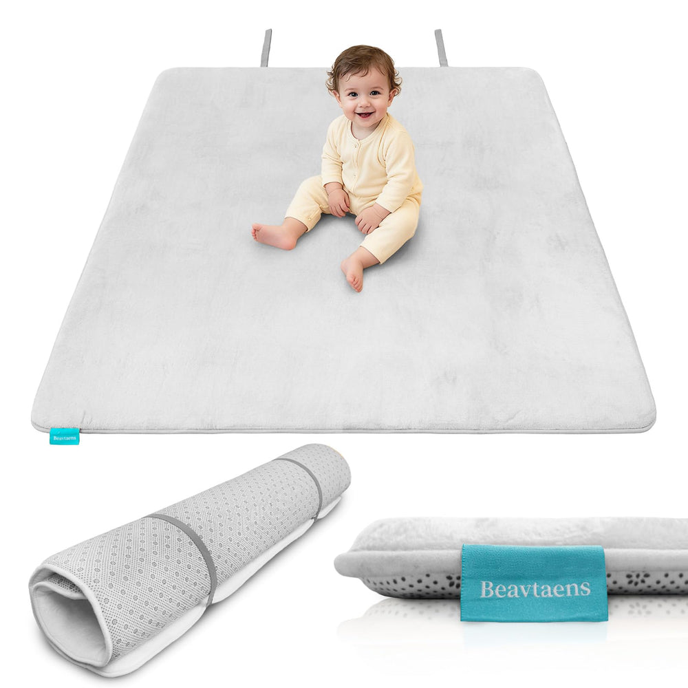 Beavtaens folded play mat with elastic storage band for easy transport.