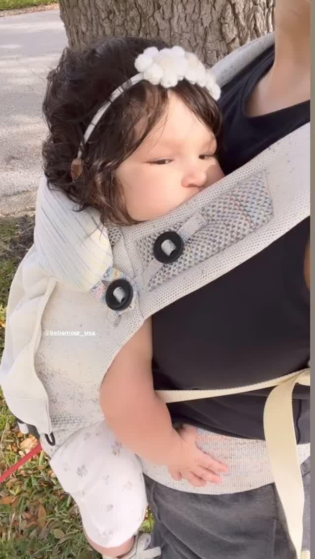 Bebamour Knit Baby Carrier head cover shields sun on sunny walks.