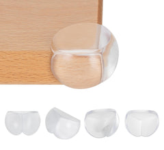 Bébé Earth corner protector on table edge; clear design for child safety.