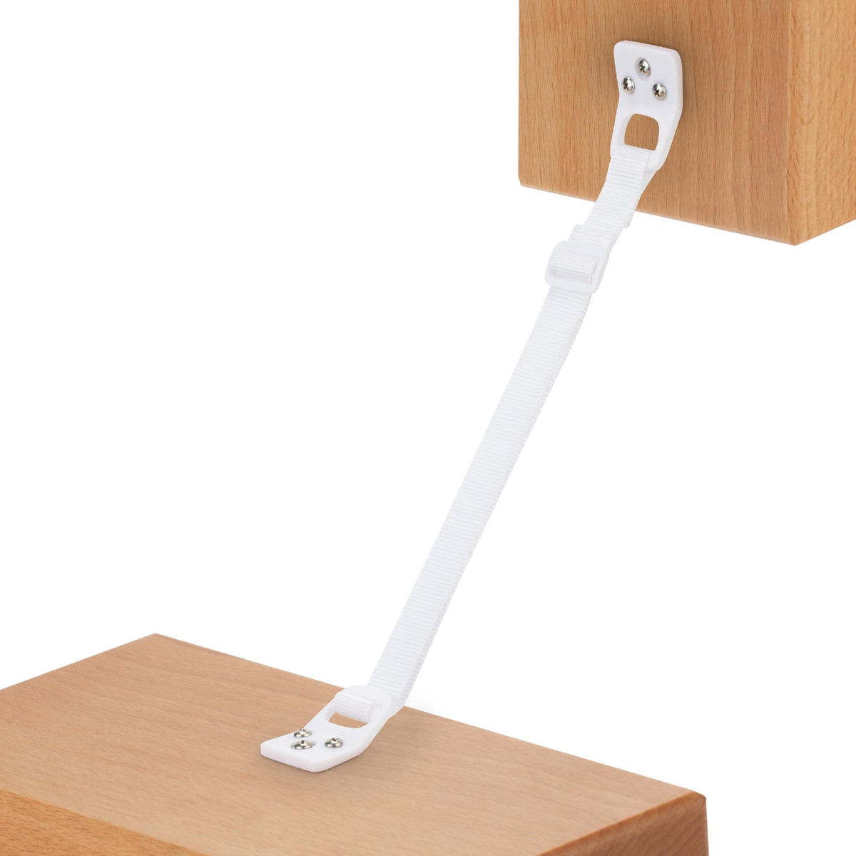 Bébé Earth furniture straps anchor a dresser for safer homes