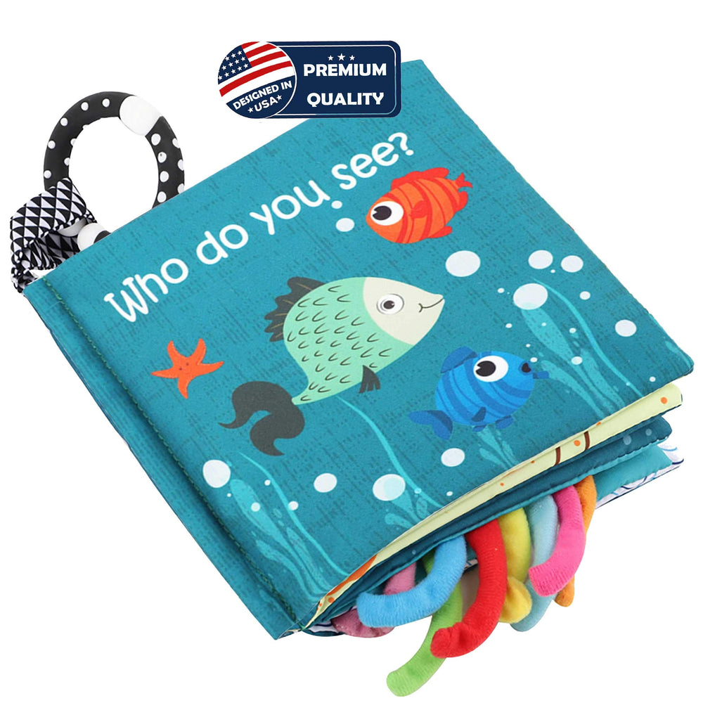 Bebe Mondo teether ring keeps the book within reach for chewing.