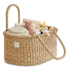BEBE BASK diaper caddy seagrass basket shows artisan weave for stylish nursery organization.