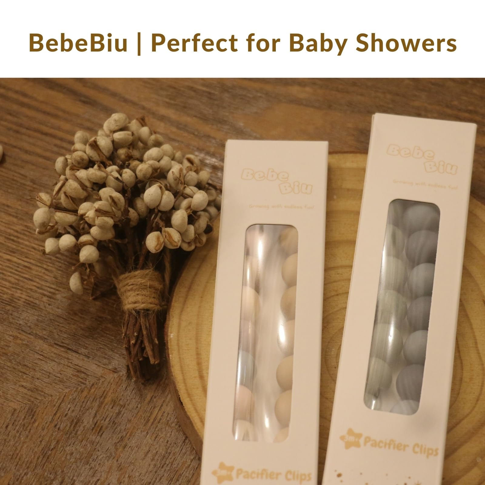 BebeBiu pacifier clip with stroller or car-seat attachment keeps essentials handy