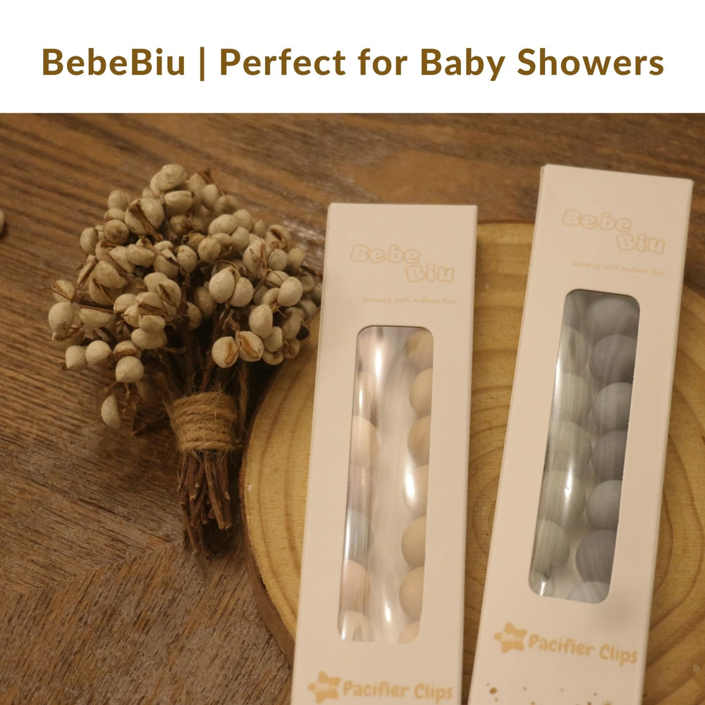 BebeBiu pacifier clip with stroller or car-seat attachment keeps essentials handy