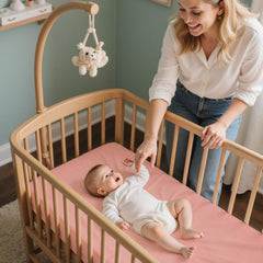 BeBeJoJo sheets show elastic edges and bottom straps for a secure, slip-free fit