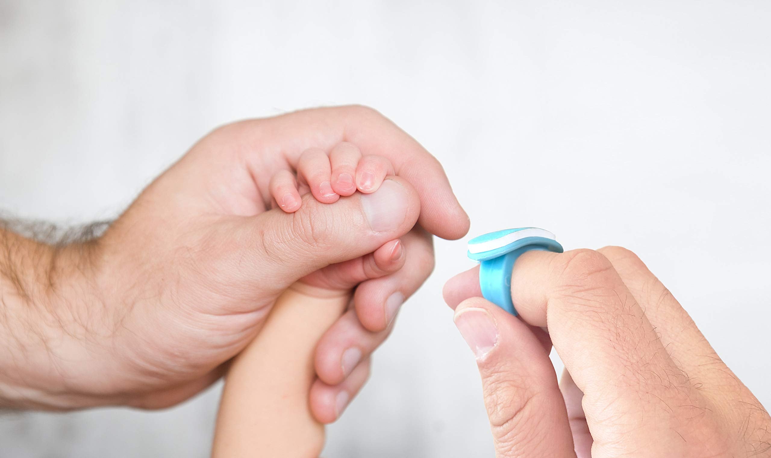 bebon parents using nail file on baby during a calm routine.