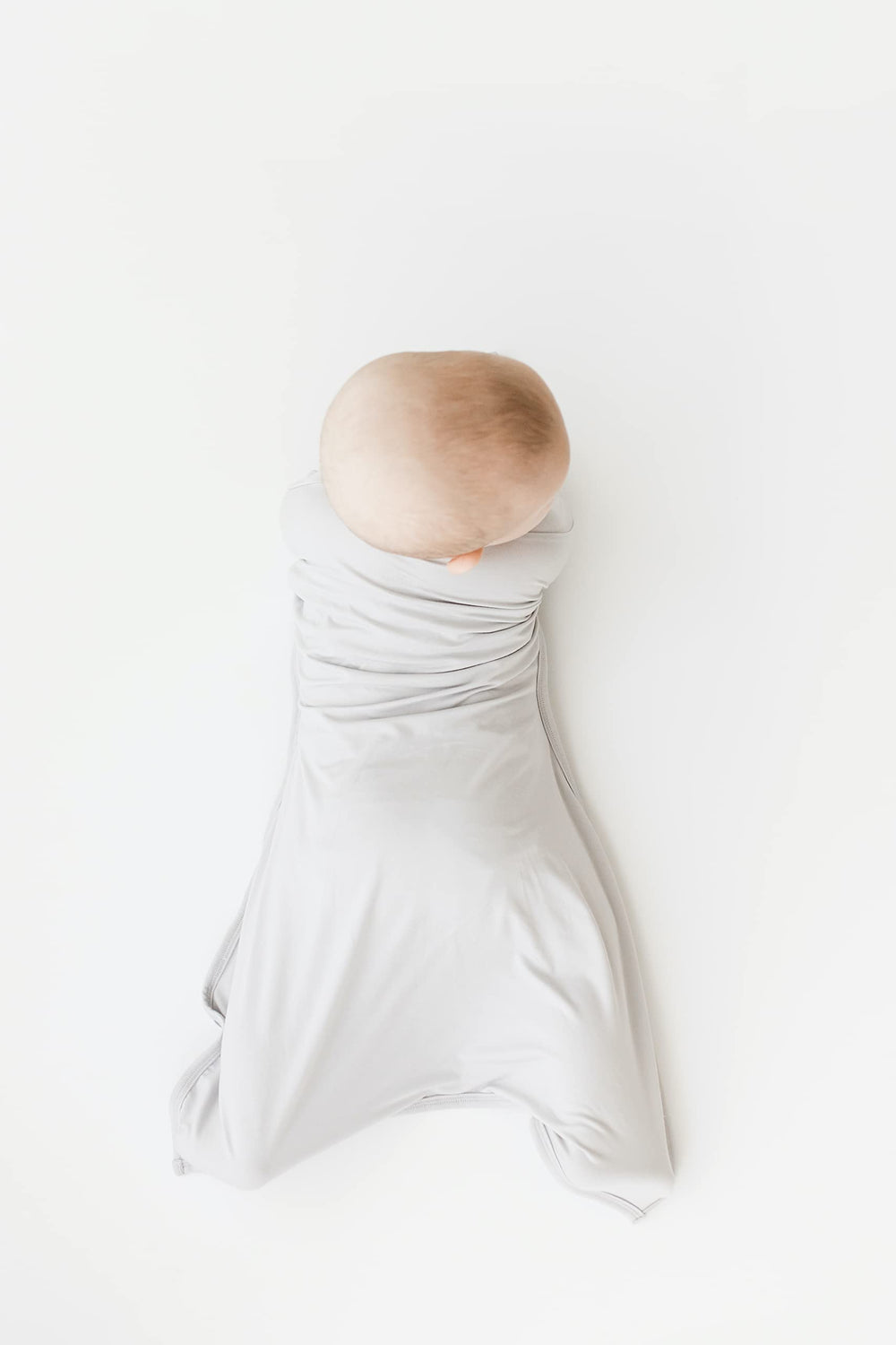 bebon Transition Swaddle CozyGrey small 4-8 month breathable bamboo fabric closeup.