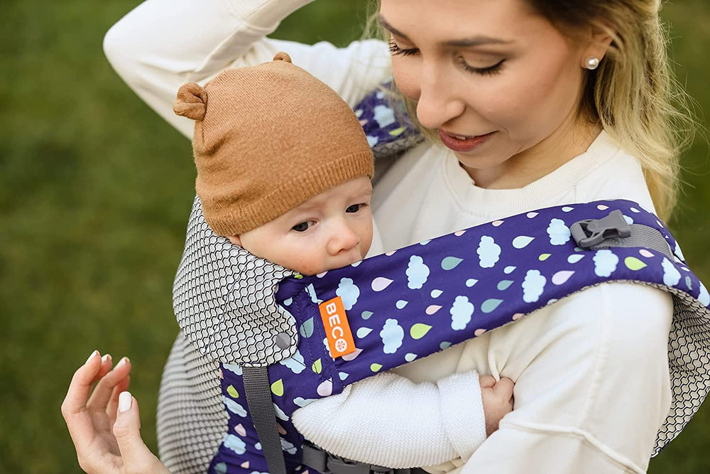 Beco Gemini side-adjustment demonstrates easy seat fit for growing infant.