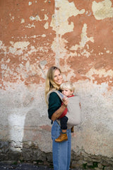 Beco front-carry setup in ecru brings your child close for bonding.