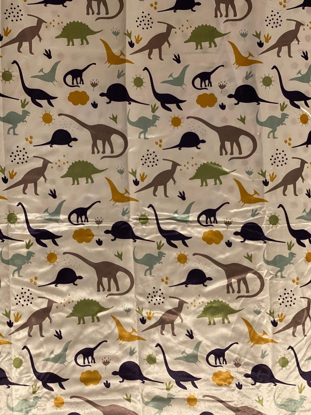 Beddings Place satin mini crib sheet Dinosaur Party design adds charming nursery aesthetic
