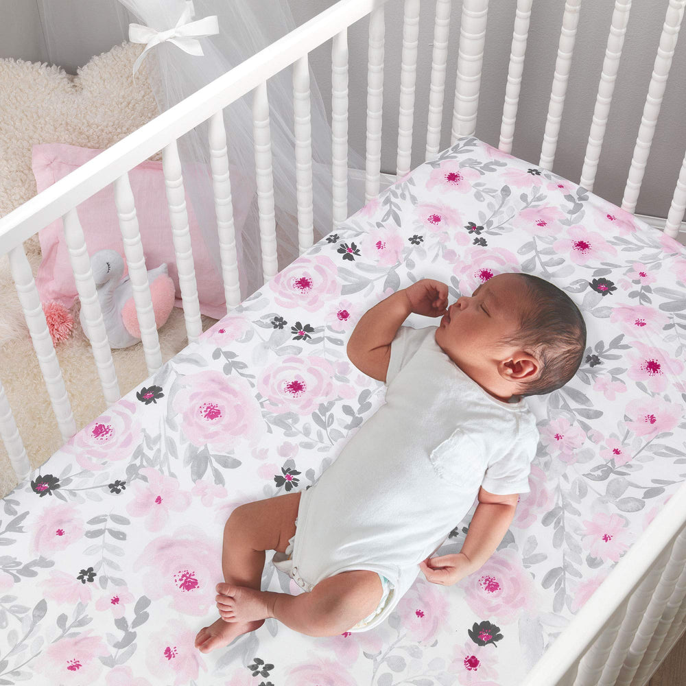 Bedtime Originals Blossom Pink Shirred Crib Skirt adds luxury designer touch
