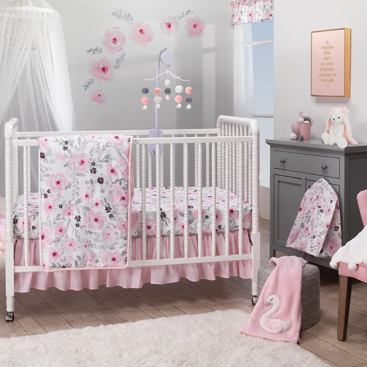Bedtime Originals Blossom Pink Watercolor Quilt with soft floral print for a cozy nursery look