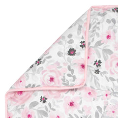 Bedtime Originals Blossom Pink Watercolor Crib Sheet close-up shows microfiber texture