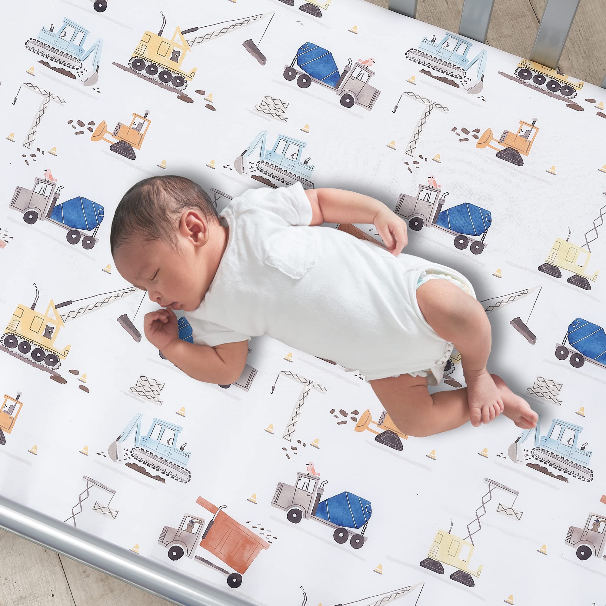 Bedtime Originals Construction Zone sheet closeup microfiber for soft, cozy naps.