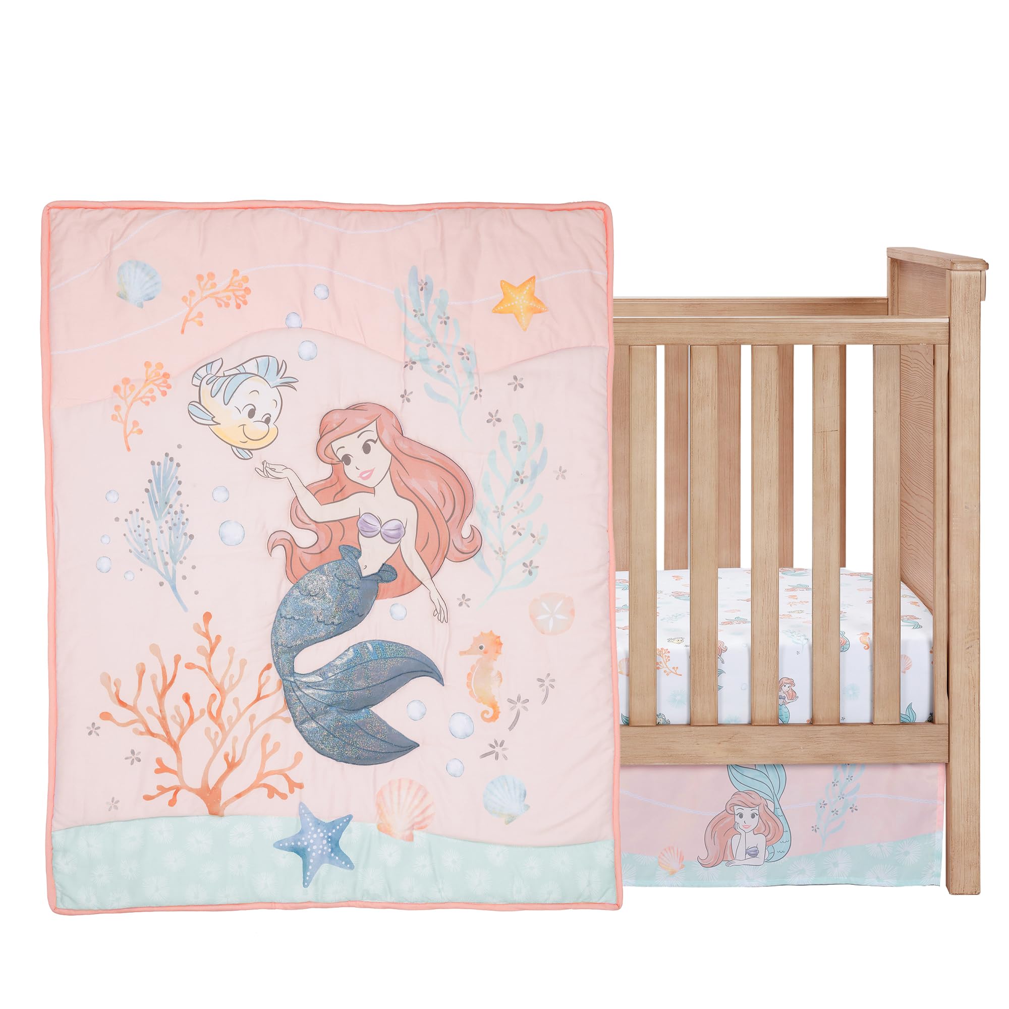 Bedtime Originals Disney Baby Little Mermaid fitted sheet close-up showing elastic all around for secure fit