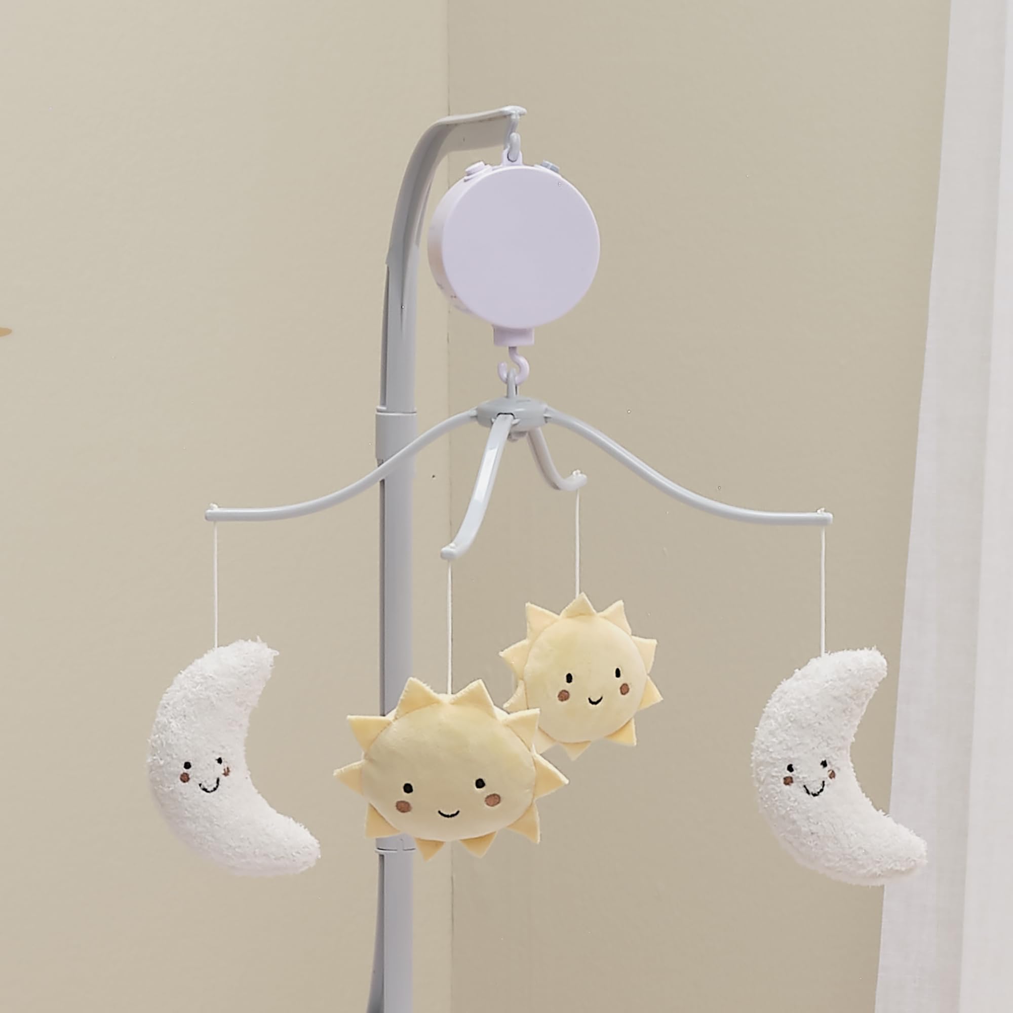 Bedtime Originals Little Star mobile features gentle rotating decor for early development interest.