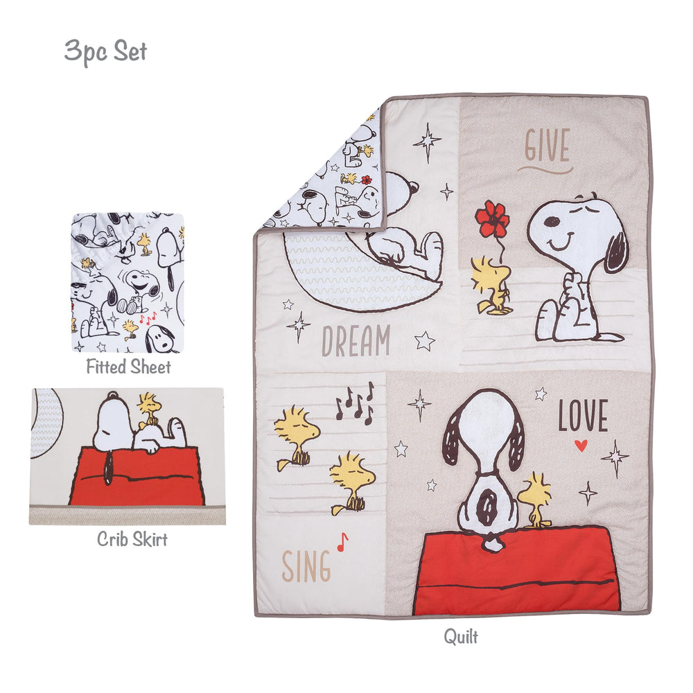 Bedtime Originals Snoopy Love dog house and moon detail on quilt.