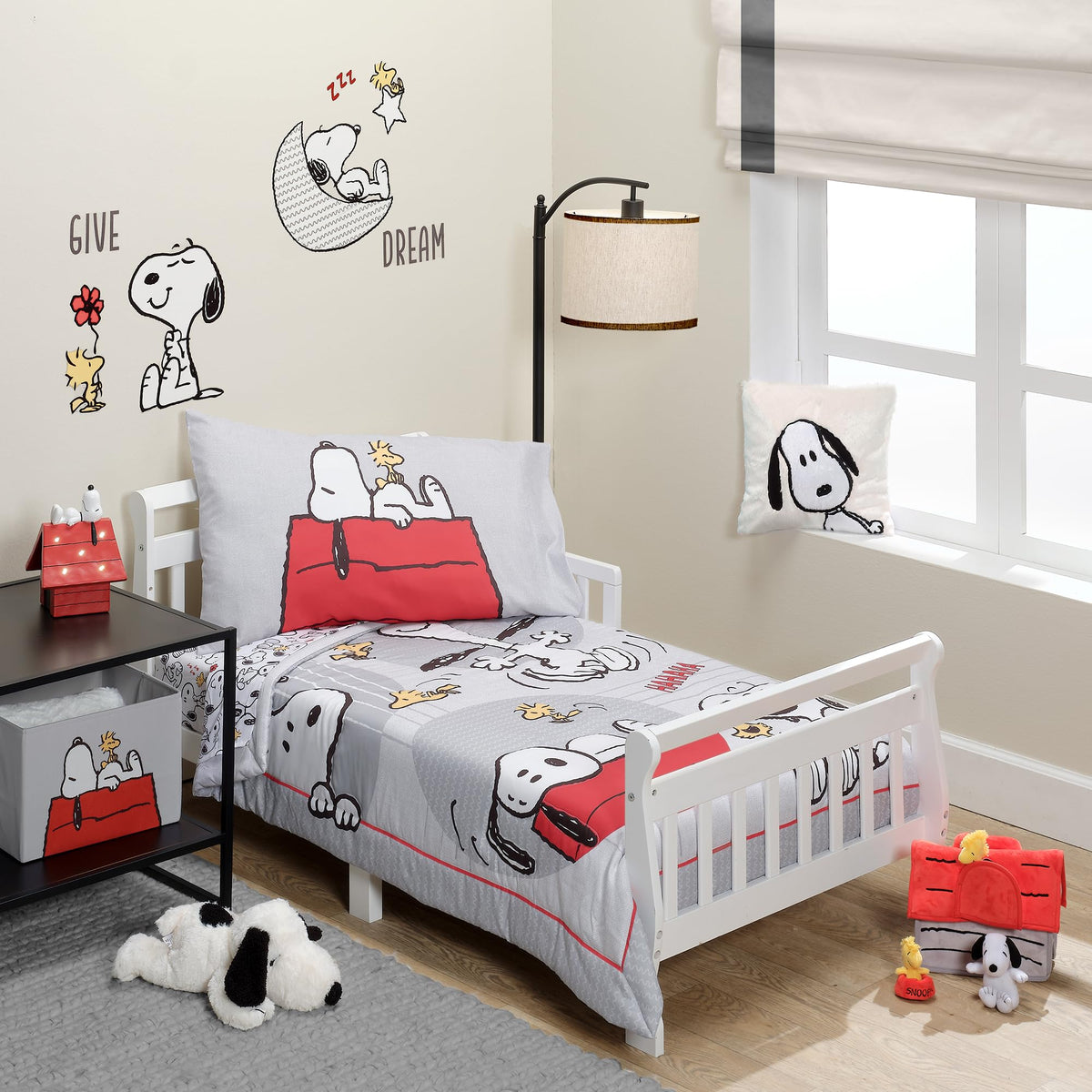 Bedtime Originals Snoopy Love quilt close-up with Woodstock for cozy bedtime snuggles.