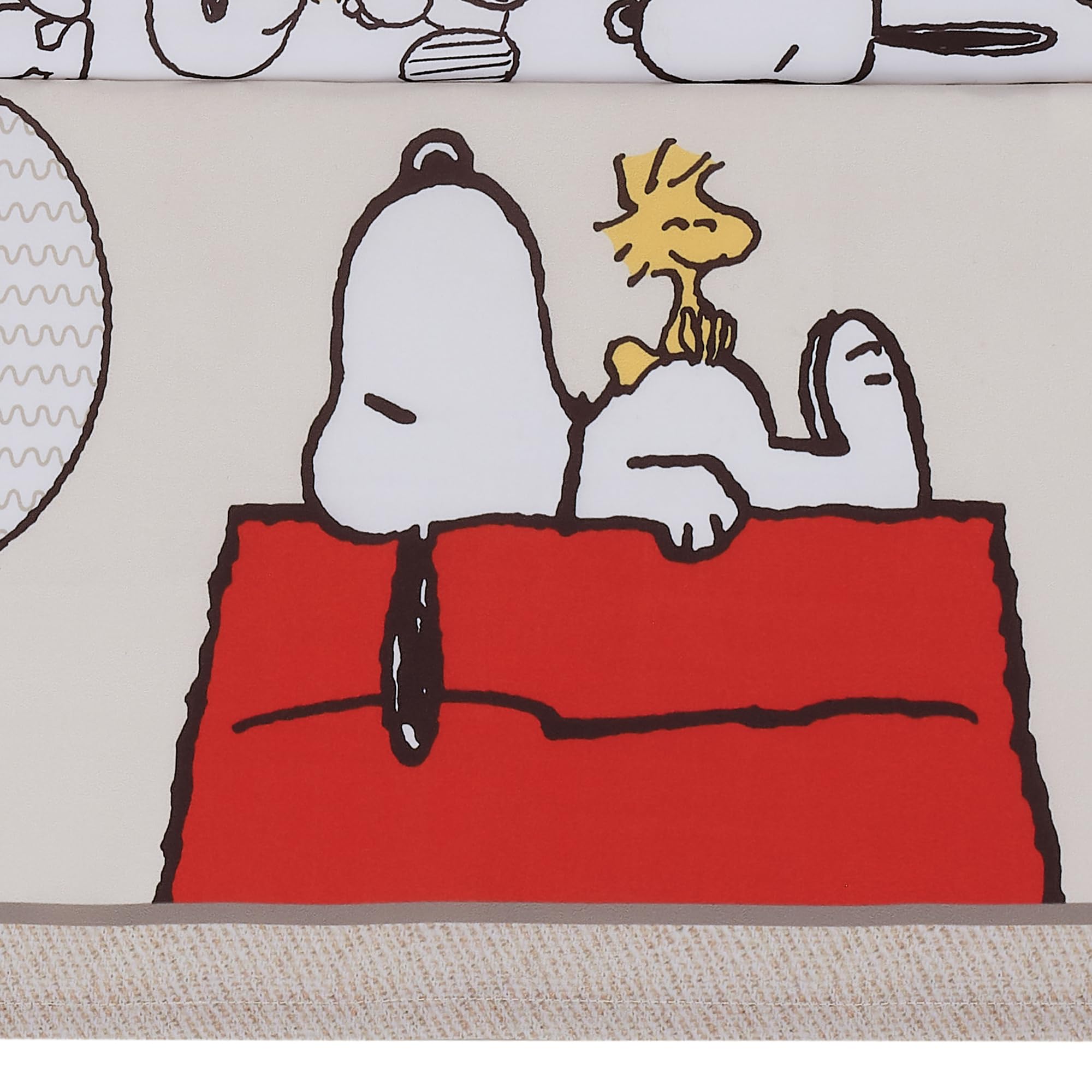 Bedtime Originals Snoopy Love Snoopy pose detail highlighting character charm.