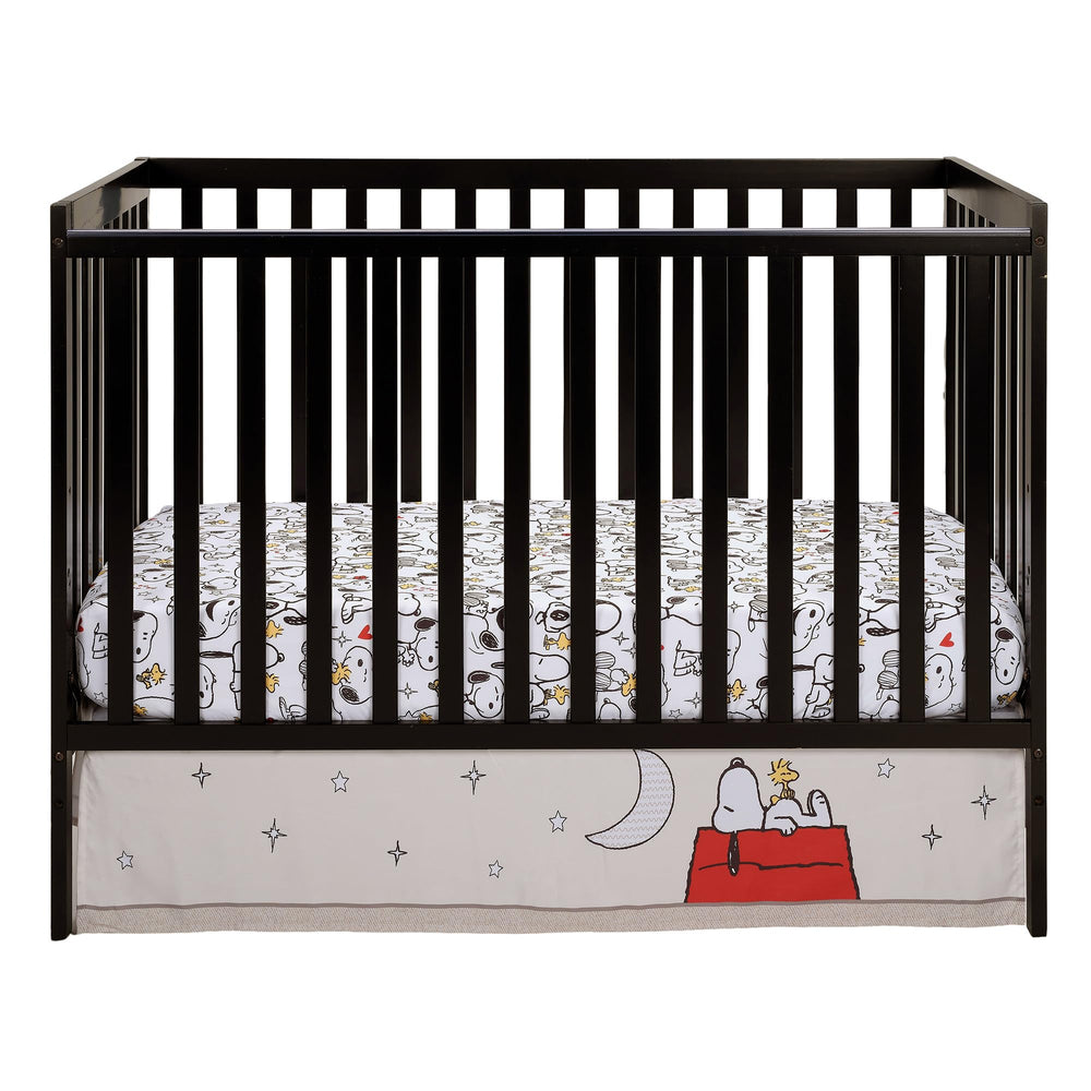 Bedtime Originals Snoopy Love stars and moon motif adds whimsy.