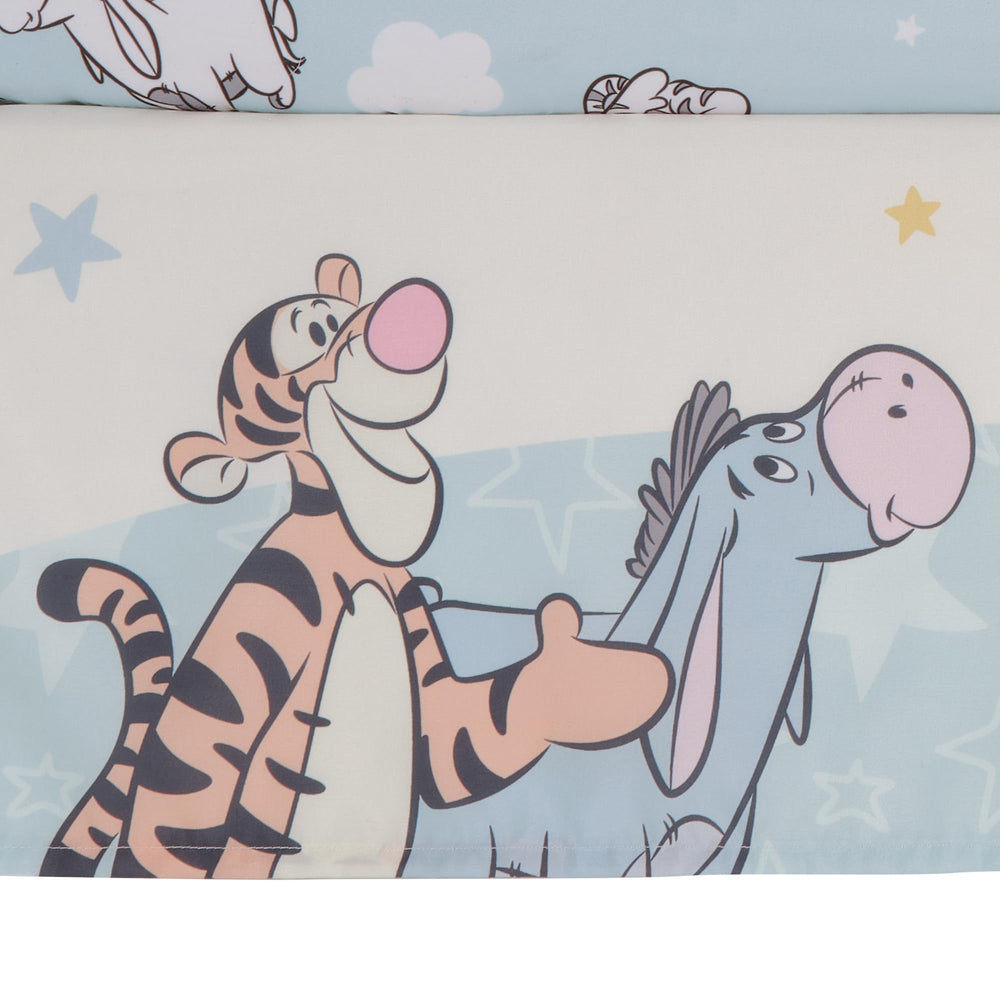 Bedtime Originals Starlight Pooh nursery scene showcases cohesive design