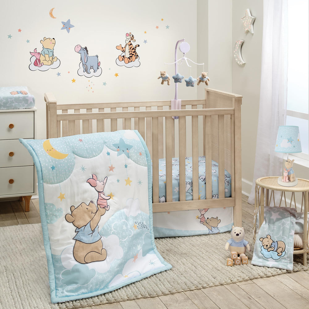 Bedtime Originals Starlight Pooh quilt applique adds whimsy to crib decor