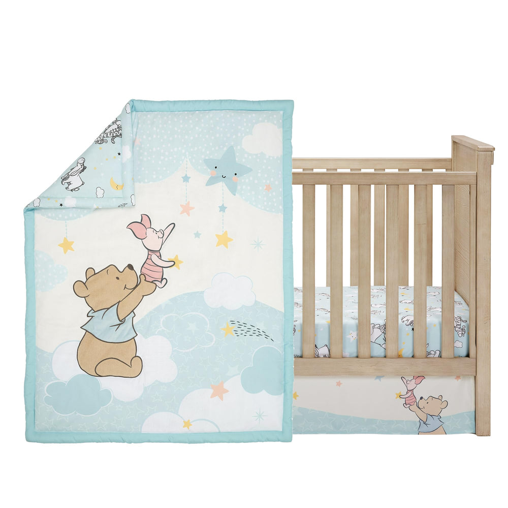 Bedtime Originals Starlight Pooh quilt bouclé texture enhances cozy charm