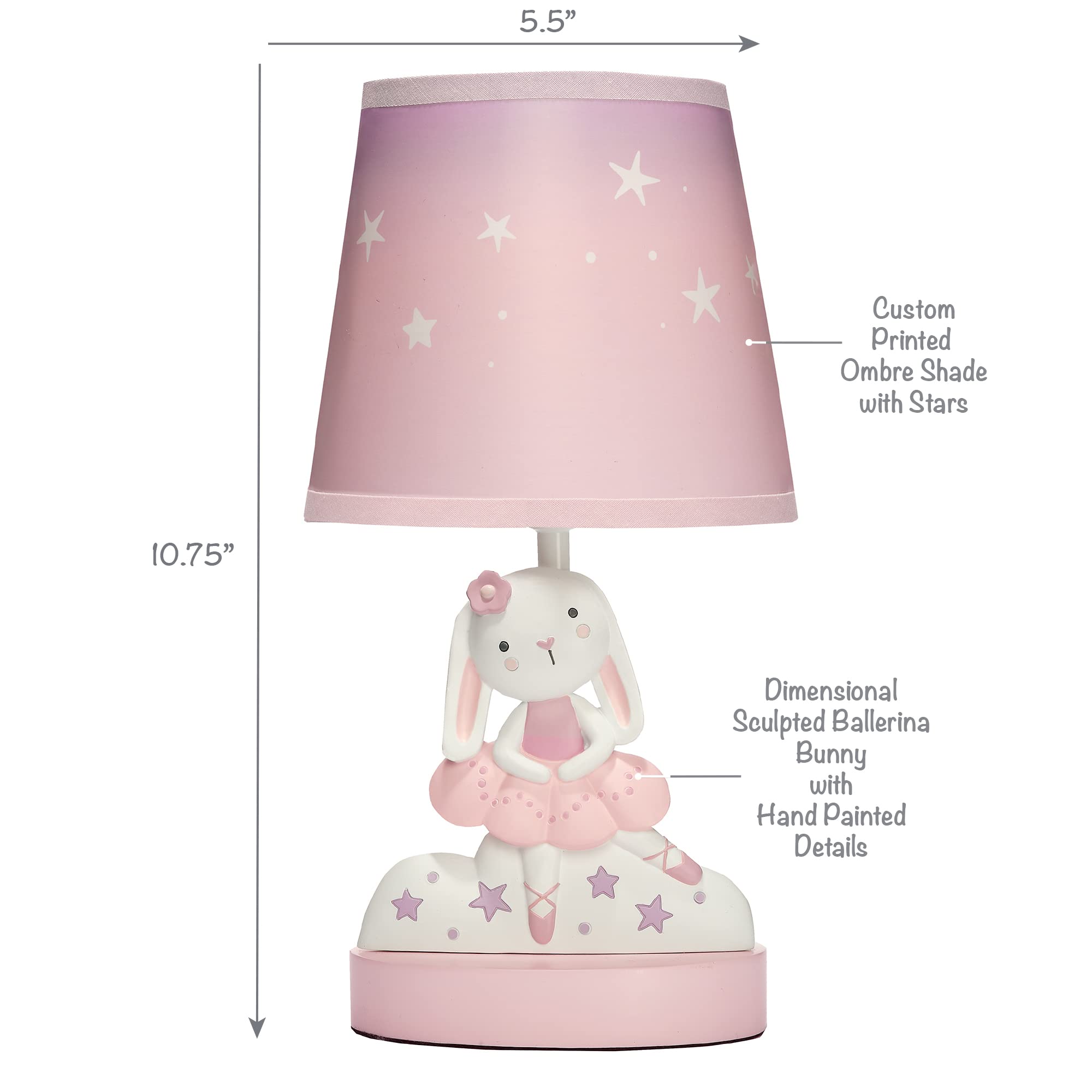 Bedtime Originals Tiny Dancer lamp lit in nursery shows gentle illumination for bedtime routines