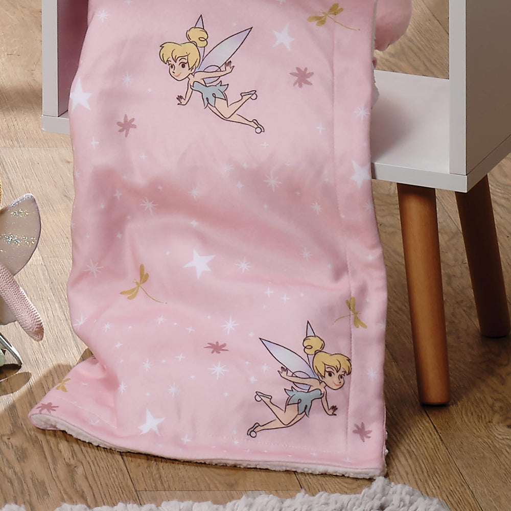 Bedtime Originals Disney Tinker Bell blanket shows white faux shearling reverse and gift-ready presentation