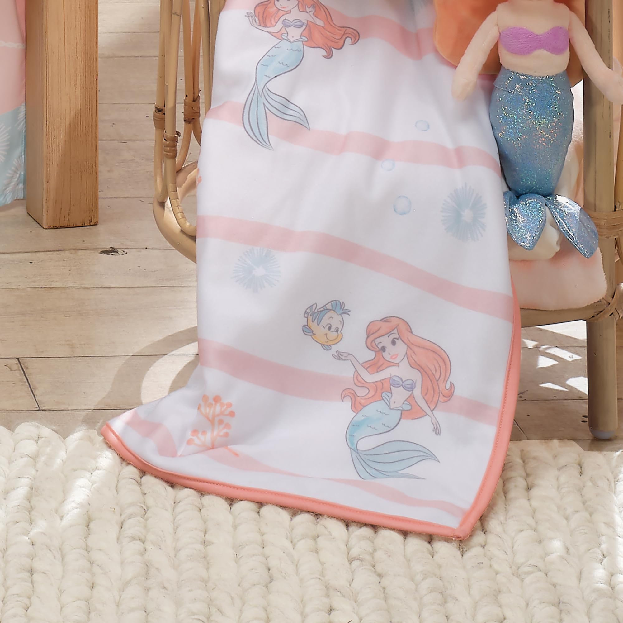 Bedtime Originals Ariel 30x40 size ensures easy coverage for newborns and infants.