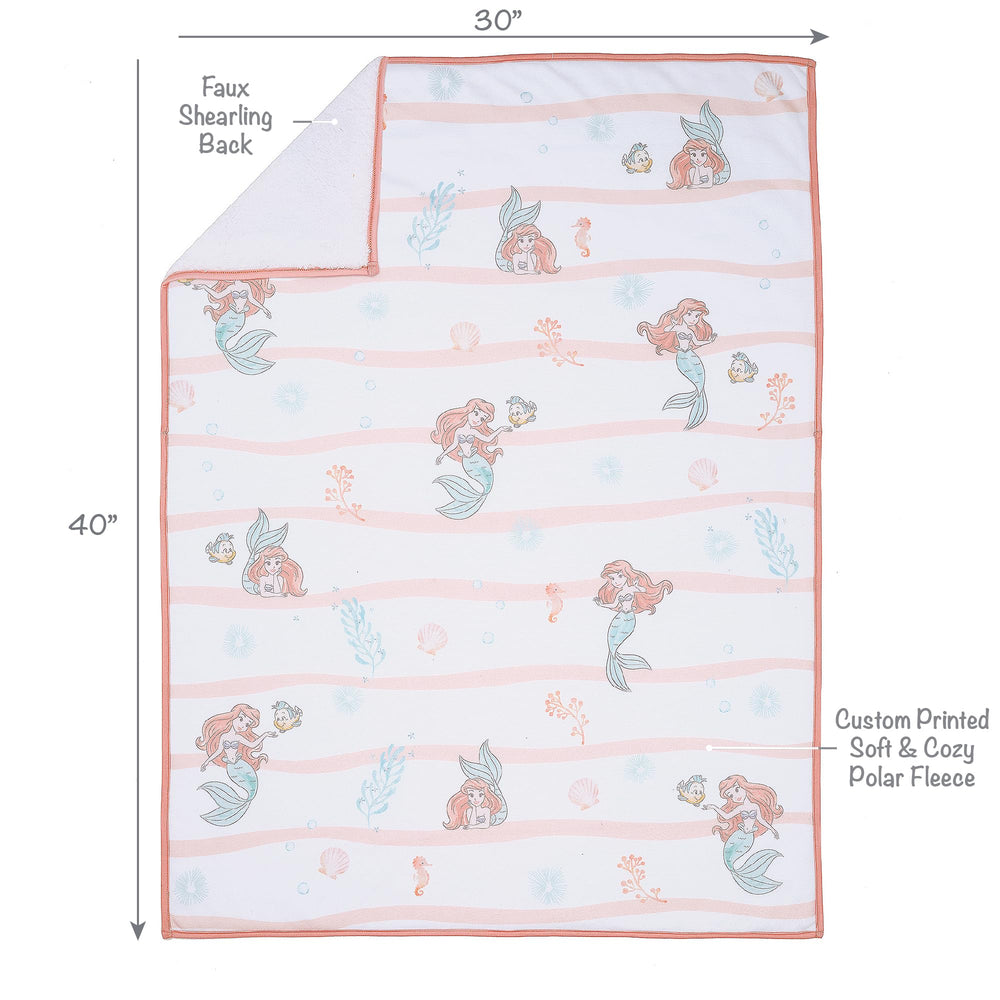 Bedtime Originals Ariel watercolors image adds peach, seafoam, coral tones to baby’s nursery.