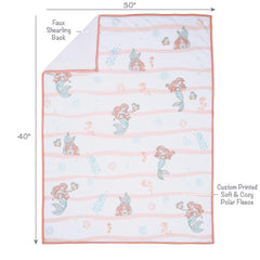 Bedtime Originals Ariel watercolors image adds peach, seafoam, coral tones to baby’s nursery.