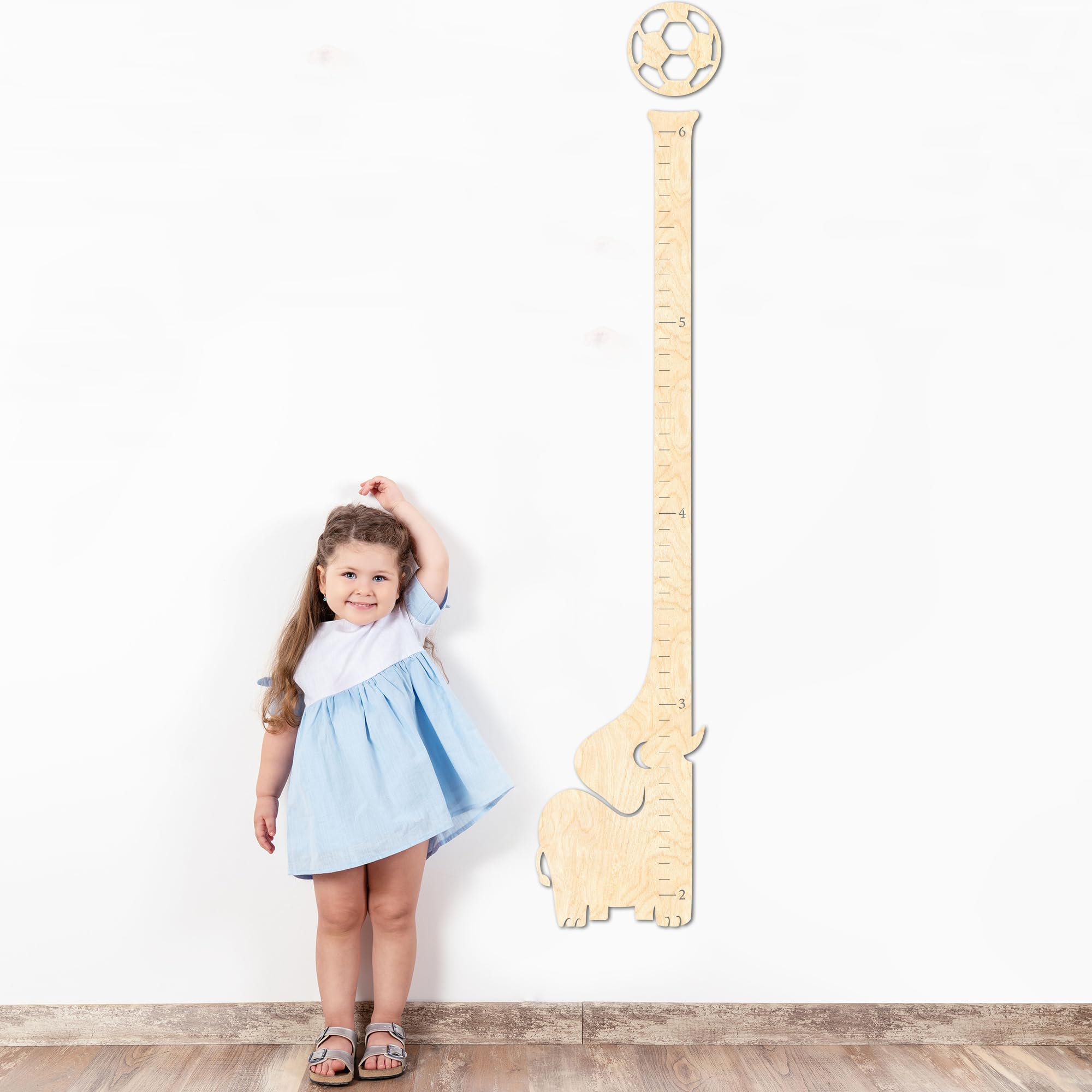 BeeGreeny elephant growth chart on wall showing six-foot height range for kids