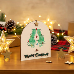 Beeveer baby footprint art mistletoe ornament side profile balanced display for photos