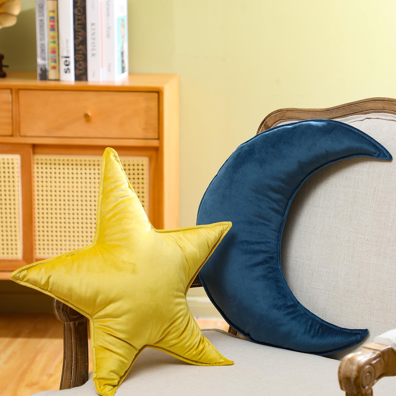 Beeveer baby room decor moon star pillow adds gentle color accents.