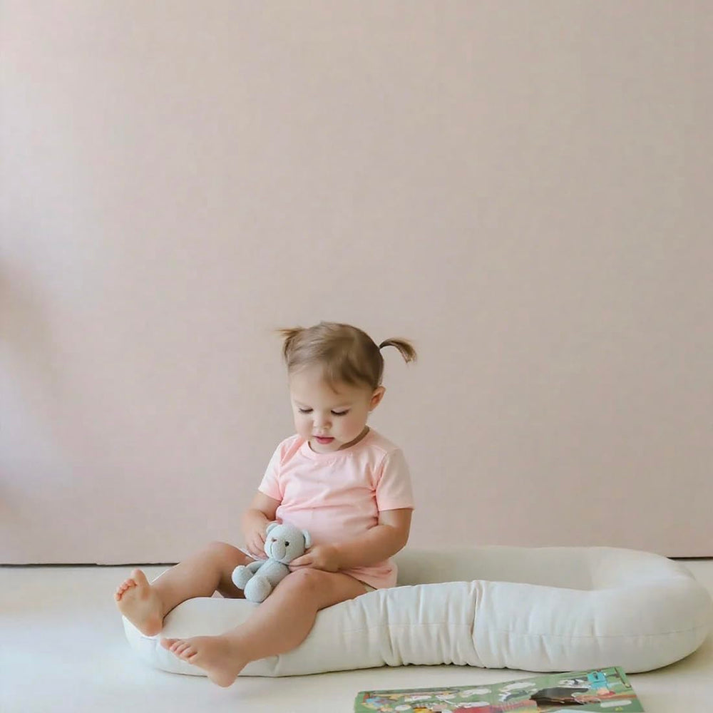 Beisurznga baby lounger cover close-up, machine washable for easy cleanup.