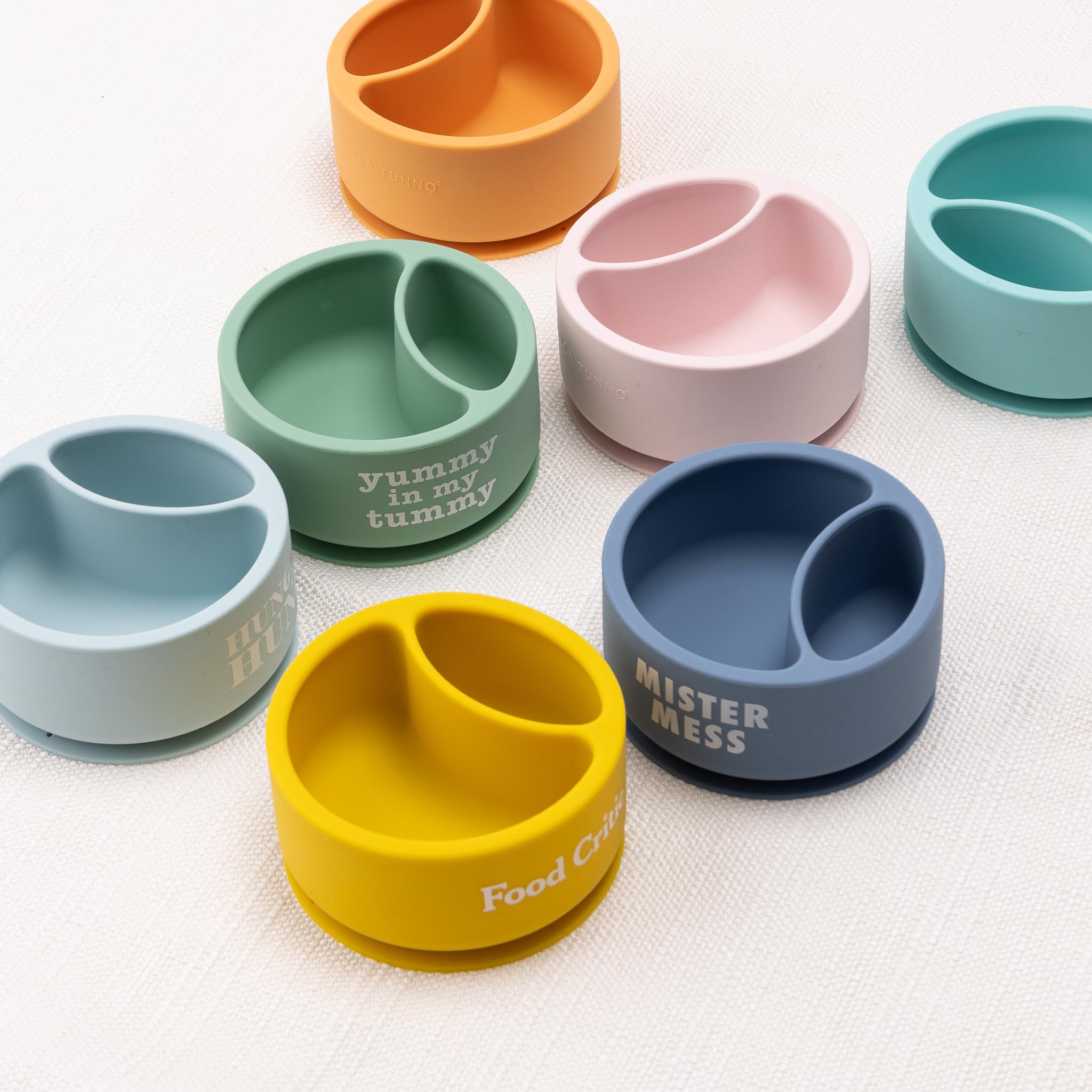 Bella Tunno Miss Mess shown on a highchair tray for mess-free feeding.