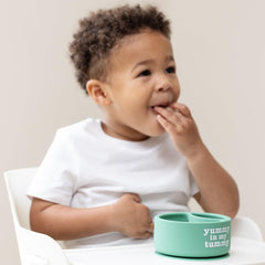 Bella Tunno Miss Mess strong suction base grips trays to reduce spills.