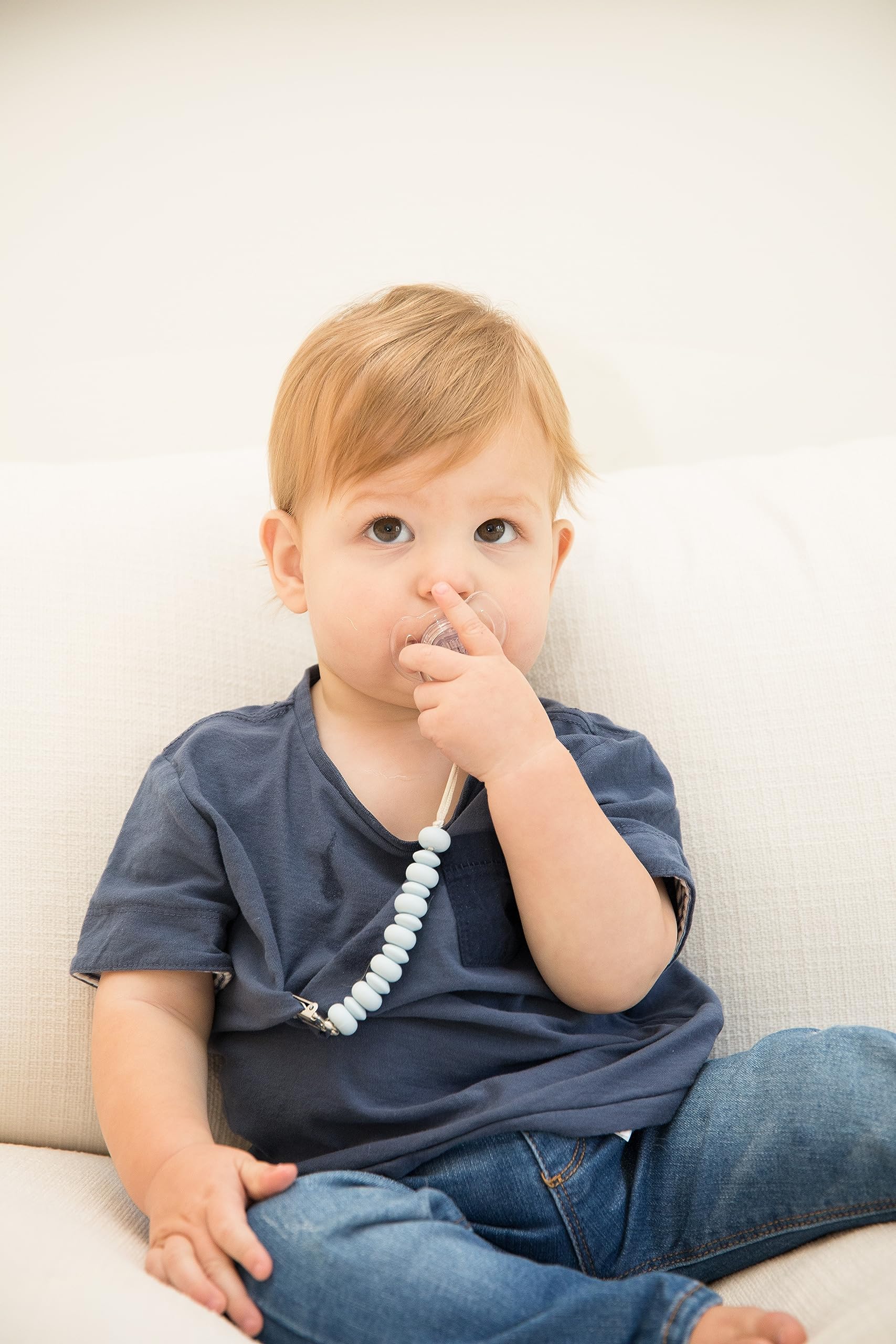 Bella Tunno pacifier clip stainless clip detail ensures secure attachment without rust.