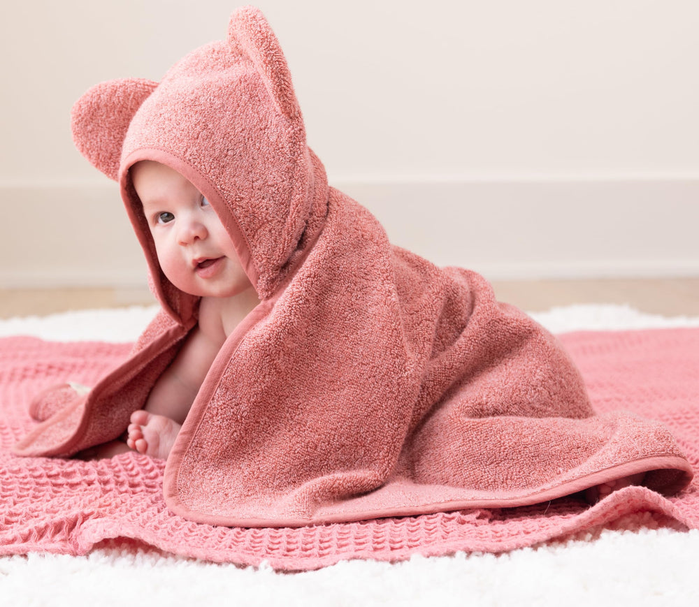 Bella Tunno Watermelon wash mitt in use during bath time for easy baby cleansing.